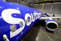A retrofitted Southwest Airlines passenger jet is shown in a hangar at Love Field on Sept